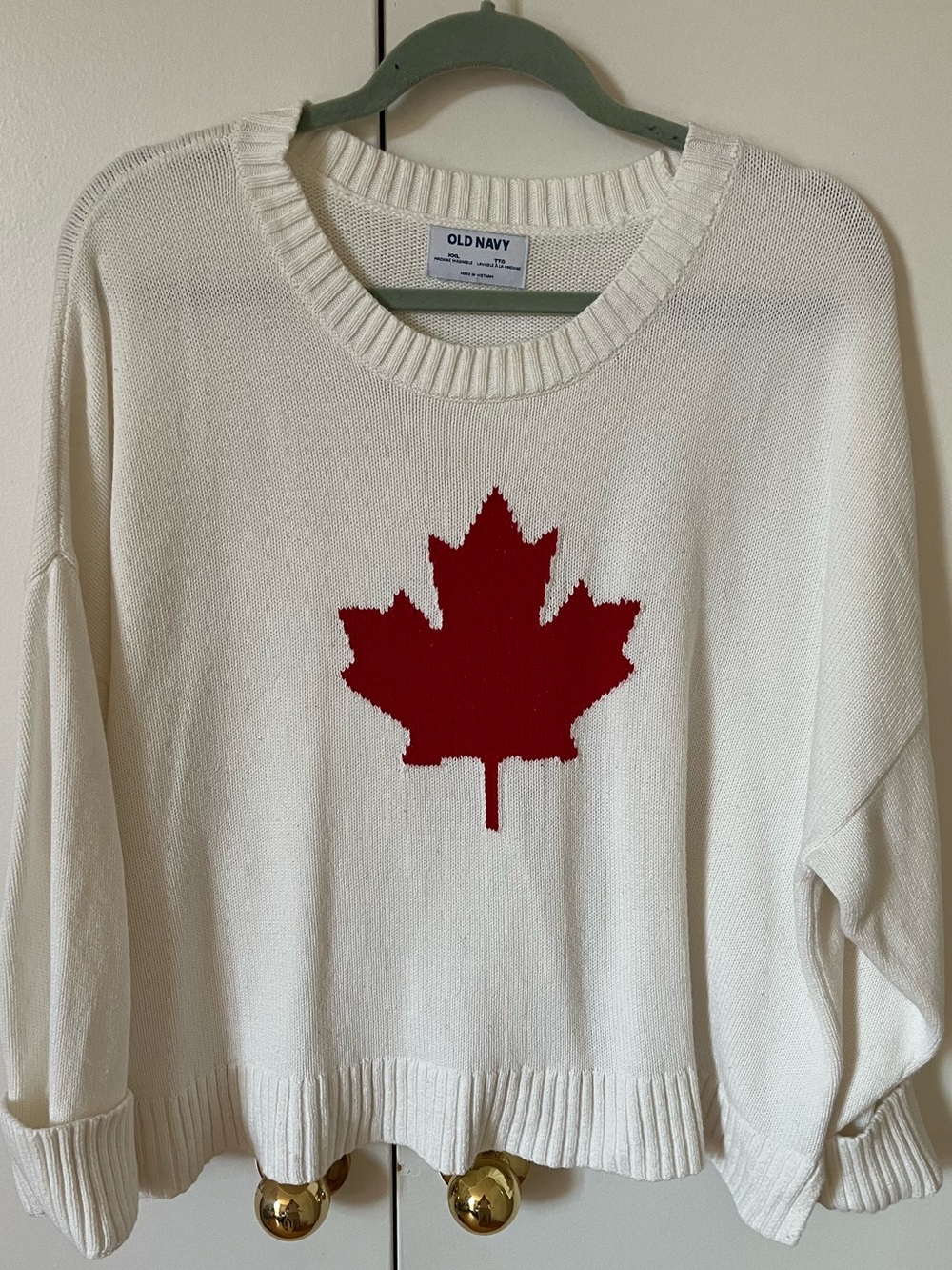 Old Navy Cream Sweater with Red Maple Leaf Graphic